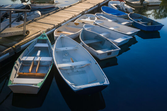 Boats and dinghies moored at the commercial dock