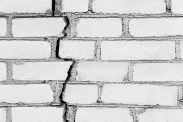 Old white cracked brick texture wall damaged background broken