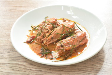 spicy stir fried river shrimp with slice grass leaf curry on plate 
