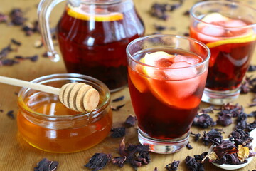 Dried hibiscus flower drink with lemon, honey and ice