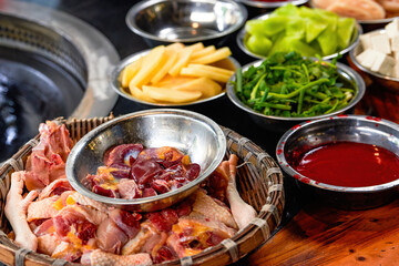 Ingredients for a freshly diced raw chicken and fried chicken