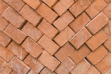 Brick red brown old packed building stack construction material masonry pattern texture background