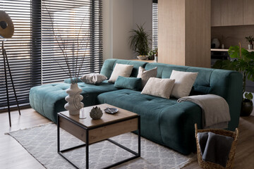 Blue corner sofa in living room - 512578822