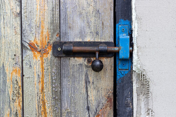 door deadbolt on an old door close-up