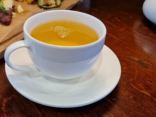 Green tea in a white cup