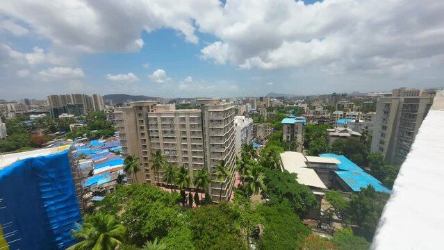 TIMELAPS MAROL TOP VIEW India Mumbai Maharashtra moving cloudes blue sky tall building Marol Andheri East