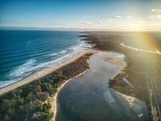 Aerial view in the late afternoon over the mouth of the Betka River in eastern Victoria, Australia,...