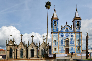 chapel of the cemetery and the facade covered with azulejos of the church Santa Marinha in Cortegaca, Ovar district, Portugal