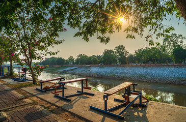 Exercise area with exercise machine  at Nan River and the Public outdoor Park for relaxing walking in Phitsanulok,Thailand in the evening, Healthcare Concept