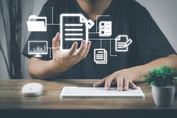 Document Management System(dms) concept. Male hands operating a computer. to manage online that is easy, convenient, fast and enhances the efficiency of digital transformation for the organization