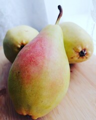 A ripe fresh pear is on the table