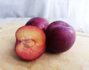 Fresh ripe plum is on the table