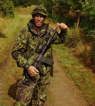 Danish Scout Unit Member (Special Forces) doing training. Yuri Arcurs own snapshot photos from his military days..