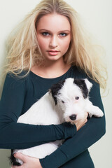 Im an animal lover. Portrait of a gorgeous young woman holding her adorable dog.