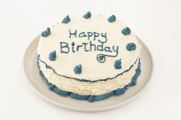 Whats a birthday without a cake. High angle shot of a pretty birthday cake with blue frosting.