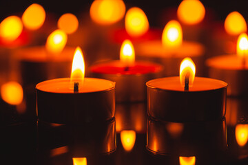 Candle,Many candles burn with a shallow depth of field 