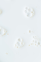 Macro milk background,Bubbles on milk surface 