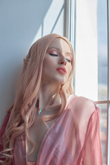 Beauty portrait of anime princess elf woman with pink hair in underwear. Fabulous magical look,...