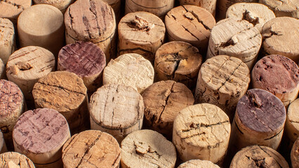 Crowd of used wine corks as background