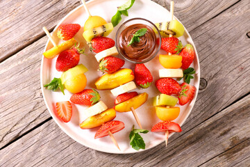 summer fruit skewer and chocolate sauce