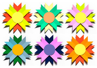 Set of paper flowers of different colors on a white background.