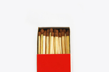 wooden yellow matches with sulfur for ignition in a paper box