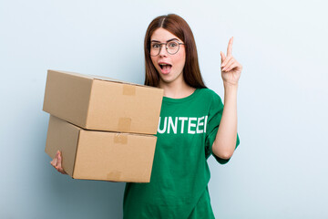 young adult pretty woman volunteer and donation concept