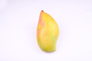 ripe yellow fresh Indian Mango isolated on white background.
