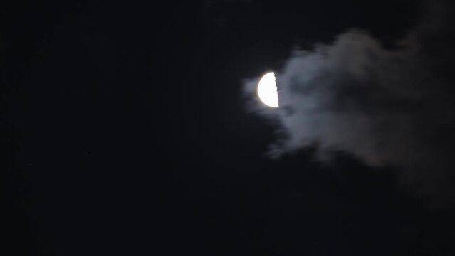 half moon and clouds