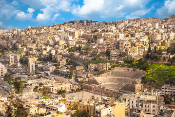 skyline of Amman, capital of Jordan, with roman theater