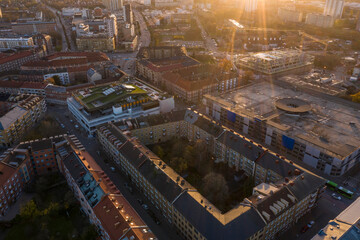 Obraz premium Aerial view of atrendy neihborhood in Malmo, sweden in autumn with sunlight