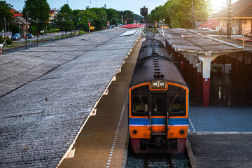 Diesel train trains with traditional public transport Thai style for commuting train approaches Phitsanulok Railway Station city in Thailand