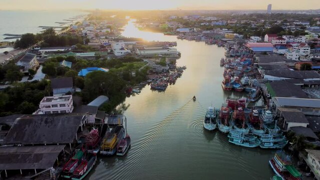 Aerial landscape view in the evening around Harbour village at Seang Chan Beach, Rayong, Thailand