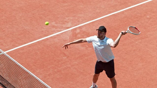 Super slow motion of tennis player hitting the ball in service. Filmed on high speed cinema camera, 1000fps.