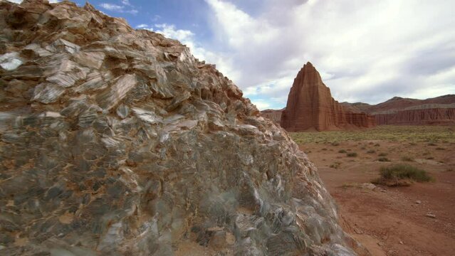 Walking past Glass Mountain viewing Temple of the Sun in Capitol Reef in the Utah desert.