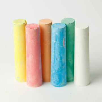 Multi-colored crayons for children's creativity on a white background.