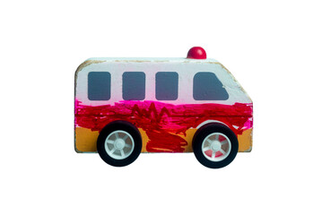 Toy wood ambulance isolated over a white background.