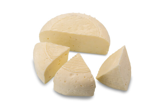 Robiola di Alba, Piedmont, Italy, soft cheese typical of the Langhe, shape with slices isolated on white, clipping path incluted