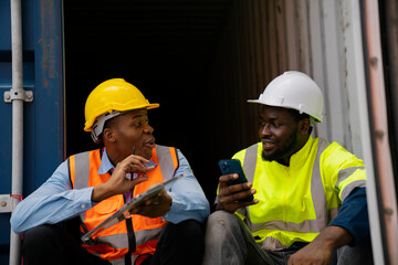 African American working engineer foreman talk while taking a break