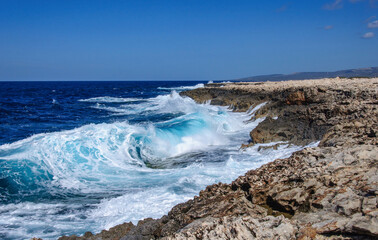 Big waves break on the rocky shore on the mediterranean sea.Cyprus