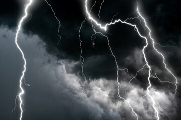 Dark cloud at evening sky with thunder bolt. Heavy storm bringing thunder, lightnings and rain in...