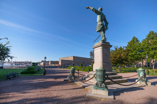 King Xll on a pedestal point east the royal castle at the bay Str&ouml;mmen a summer day in Stockholm
