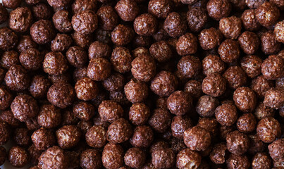Cereal chocolate corn balls as breakfast background