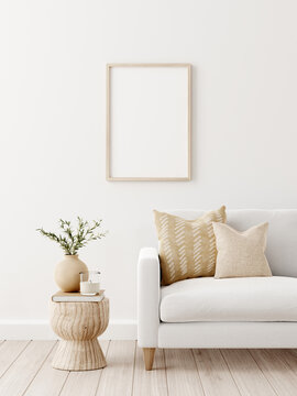 Light brown vertical wooden frame mockup in living room interior with sofa on white background. 3D rendering, illustration