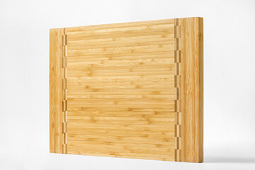 Rectangular bamboo cutting board with white background