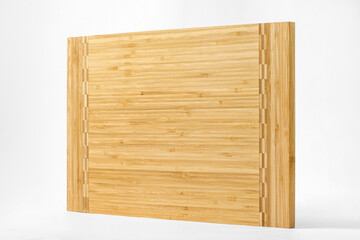 Rectangular bamboo cutting board with white background