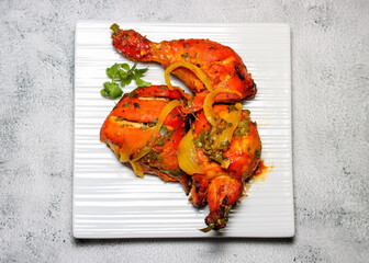 Spicy Tandoori chicken , Indian traditional dish.