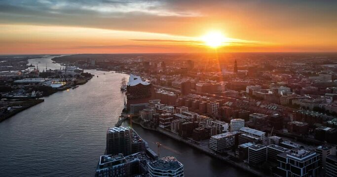 A summer sunset in Hamburg, Germany. Aerial view on Hamburg Elbphilarmonie and port. Time Lapse.
