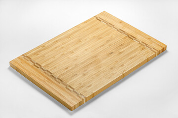 Wooden cutting board on white background