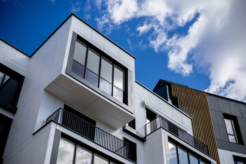 Obraz premium luxury apartments in a unique design style against the blue sky